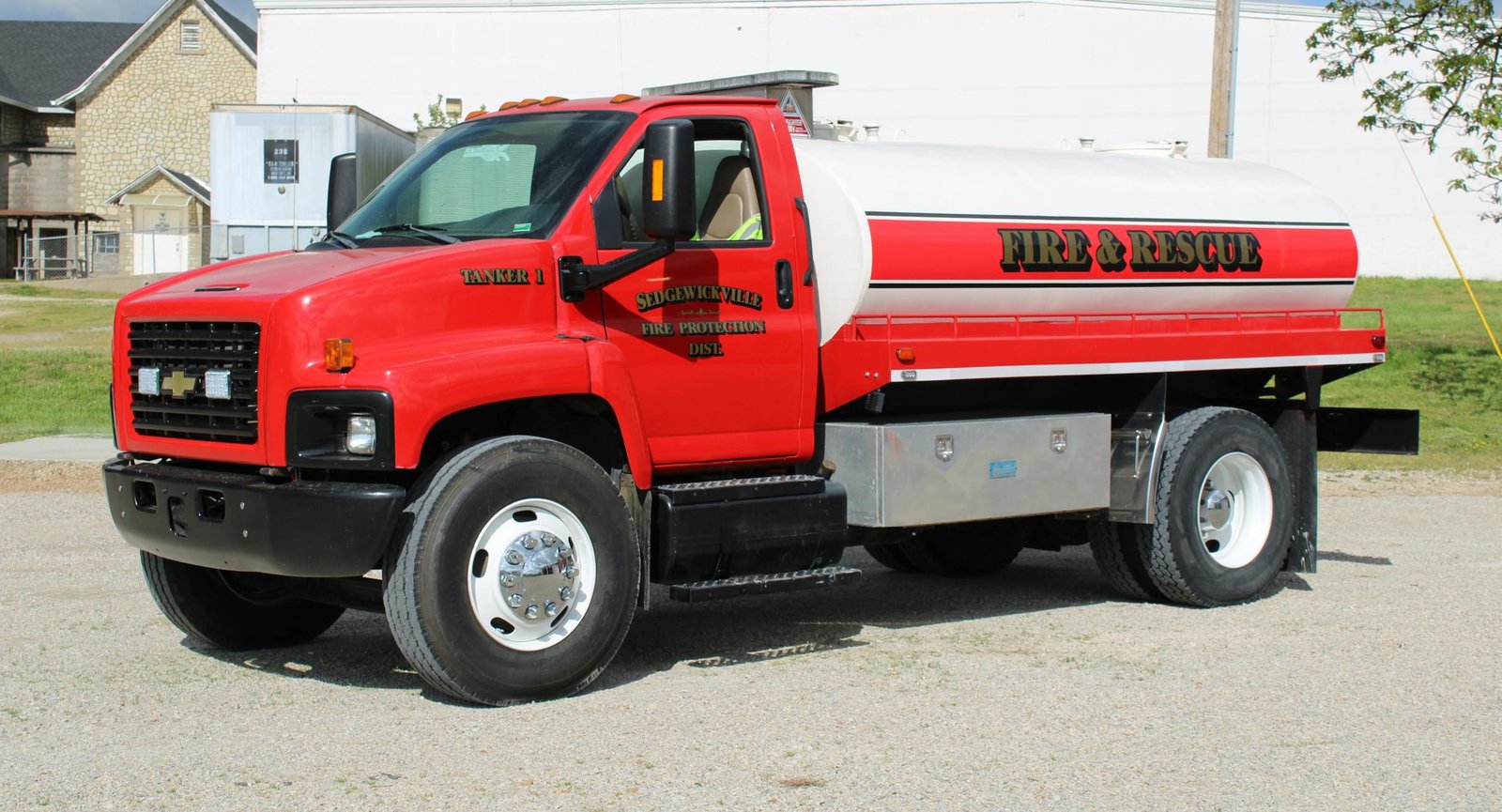 A red fire truck designed to haul water